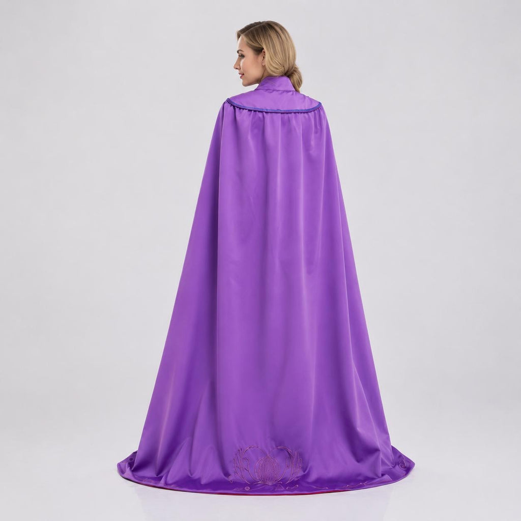 May include: A floor-length purple cape featuring a smooth, satin-like finish. The garment includes a rounded collar with a decorative trim along the neckline and a subtle, embossed floral pattern visible near the bottom hem of the fabric.