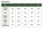 May include: A size chart table with a dark green header labeled Description. Columns list sizes S, M, L, XL, and XXL. Rows detail measurements in centimeters for clothing length, bust, shoulder width, sleeve length, and hip circumference.