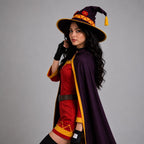 May include: A costume featuring a dark purple pointed witch hat with a yellow band and red circular emblem, a matching dark purple cape with yellow trim, and a red tunic with yellow geometric hem details, worn with black fingerless gloves.