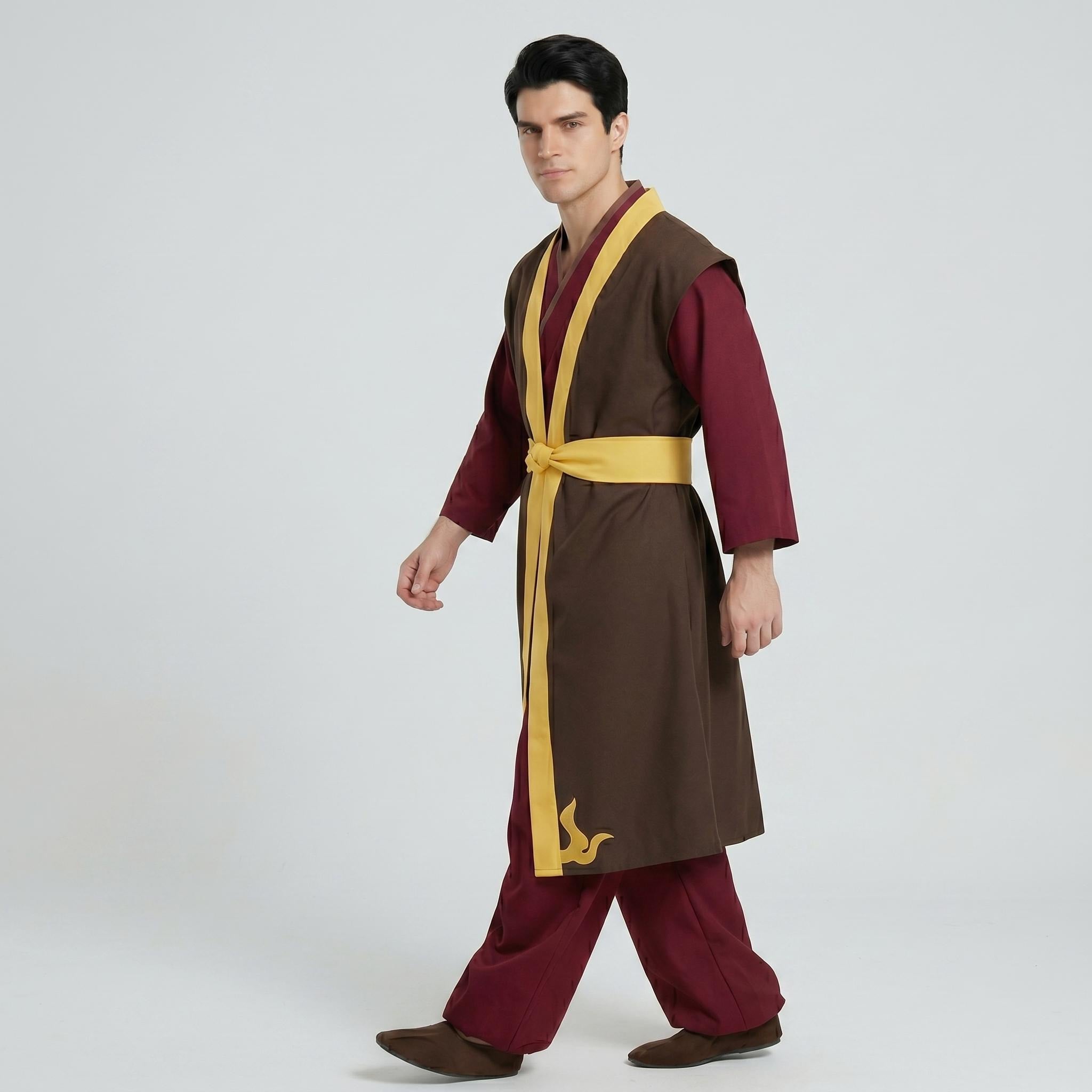 May include: A long-sleeved maroon tunic worn under a sleeveless brown overcoat with yellow trim. The overcoat features a yellow waist sash and a yellow flame-like emblem near the hem. The outfit includes matching maroon trousers and brown shoes.
