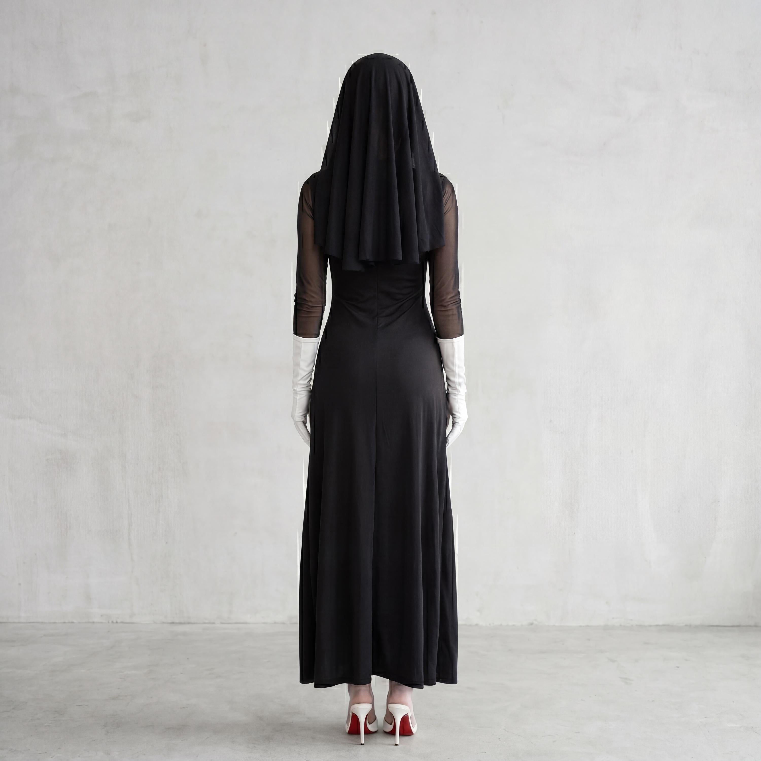 May include: A person wearing a black dress, veil, and white gloves, standing with their back to the camera. The dress is floor-length, and the veil covers the head and shoulders. The person is wearing white high heels.