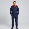 May include: A dark blue long-sleeved jacket with a bright red hood and matching red sleeve cuffs, featuring a high collar with a single gold button closure. The jacket is paired with matching dark blue trousers and black dress shoes.