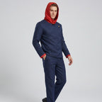 May include: A dark blue long-sleeved jacket with a red hood and matching dark blue trousers. The jacket features a high collar, a single visible button at the neck, and red cuffs at the end of the sleeves. The ensemble is a solid color set.