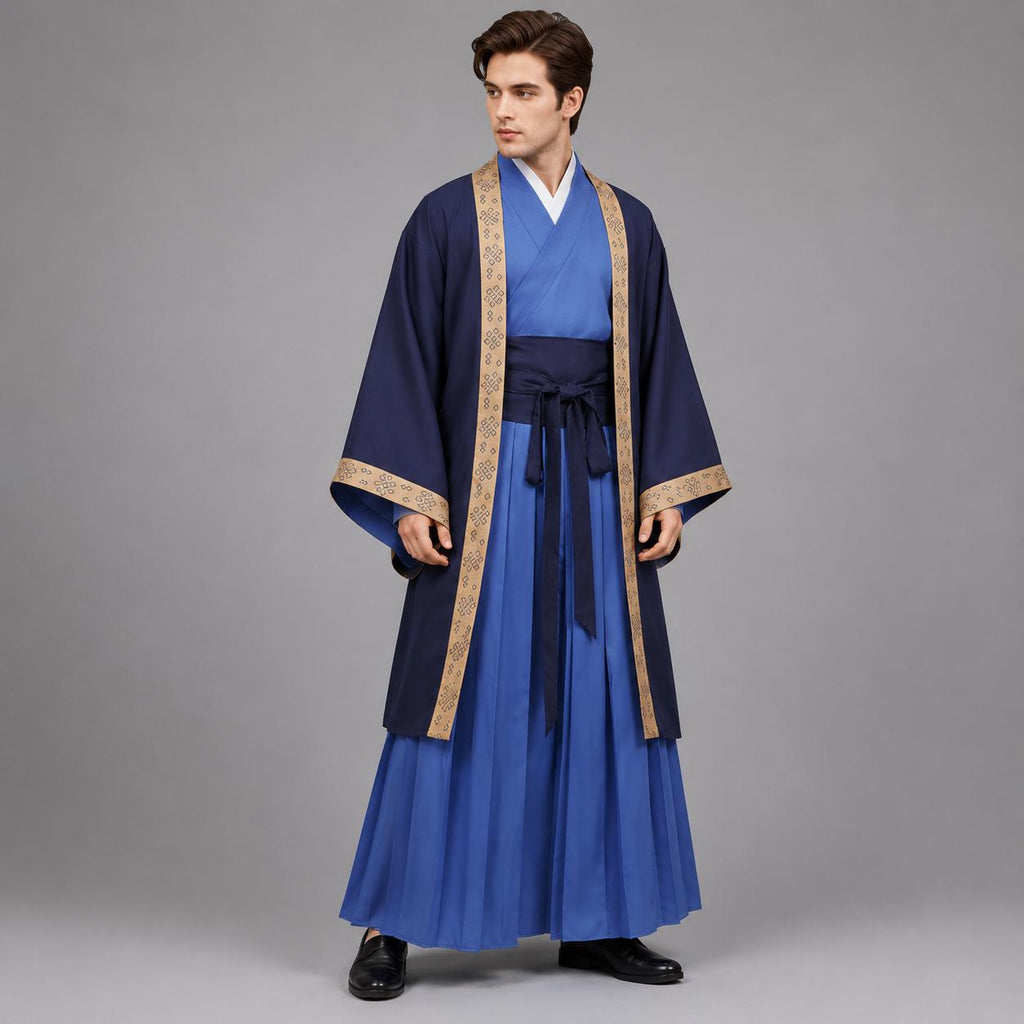 May include: A layered ensemble featuring a bright blue inner robe with a V-neckline, paired with a dark blue outer coat. The coat has wide sleeves and tan trim with a repeating geometric pattern. A dark blue sash ties at the waist over a pleated skirt.