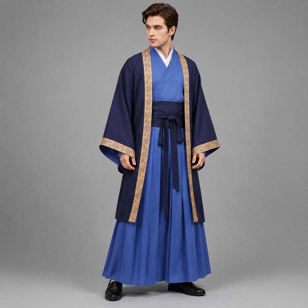May include: A layered ensemble featuring a bright blue inner robe with a V-neckline, paired with a dark blue outer coat. The coat has wide sleeves and tan trim with a repeating geometric pattern. A dark blue sash ties at the waist over a pleated skirt.