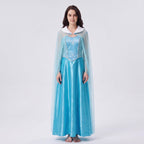 May include: A floor-length light blue satin dress featuring a fitted bodice with silver embroidery, a sweetheart neckline, and a sheer cape overlay. The garment includes a white faux fur collar trim that extends from the shoulders to the neckline.