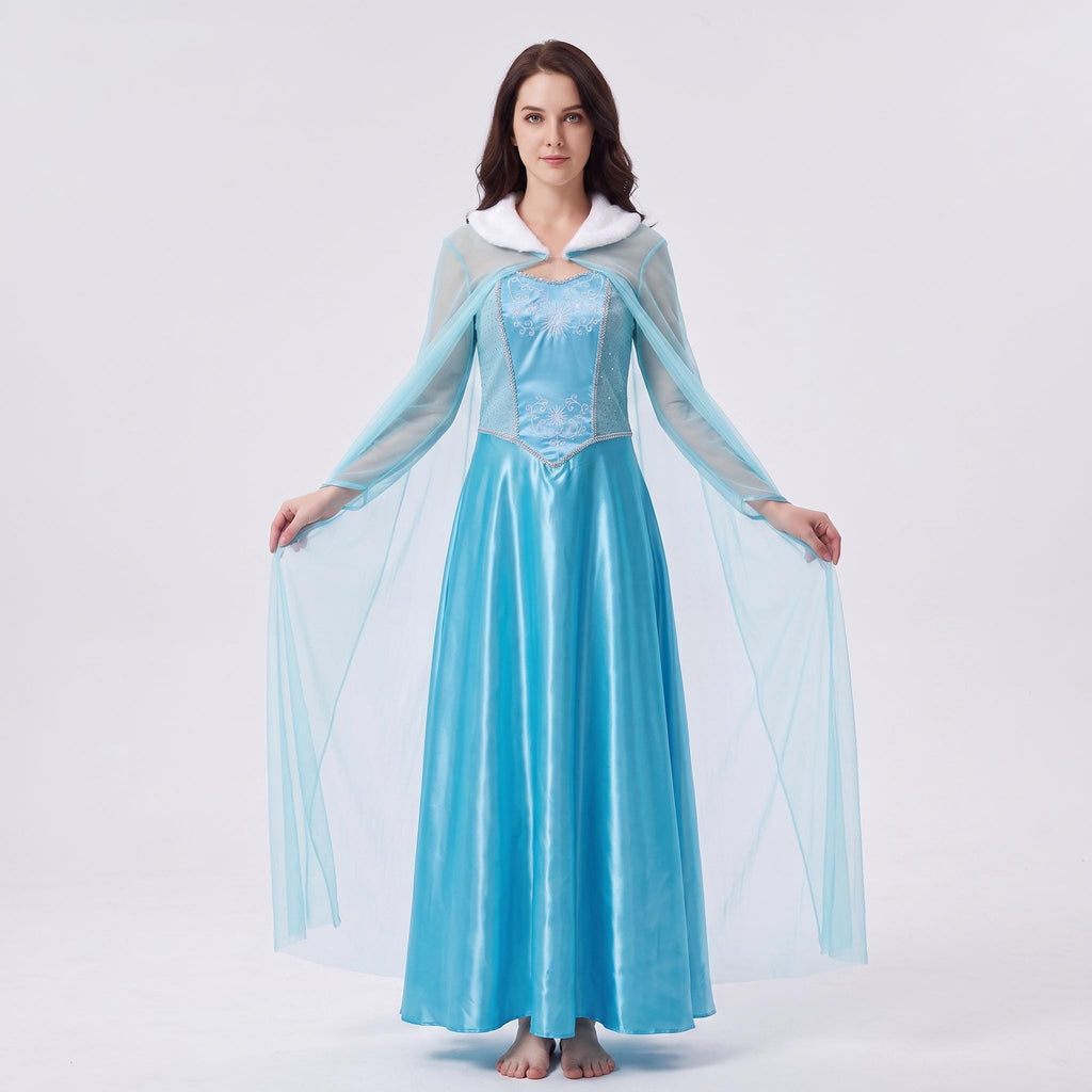 May include: A floor-length light blue dress featuring a satin-finish skirt, a bodice with silver embroidery, and sheer long sleeves. The garment includes a white faux fur collar and a long, flowing sheer cape attached at the shoulders.