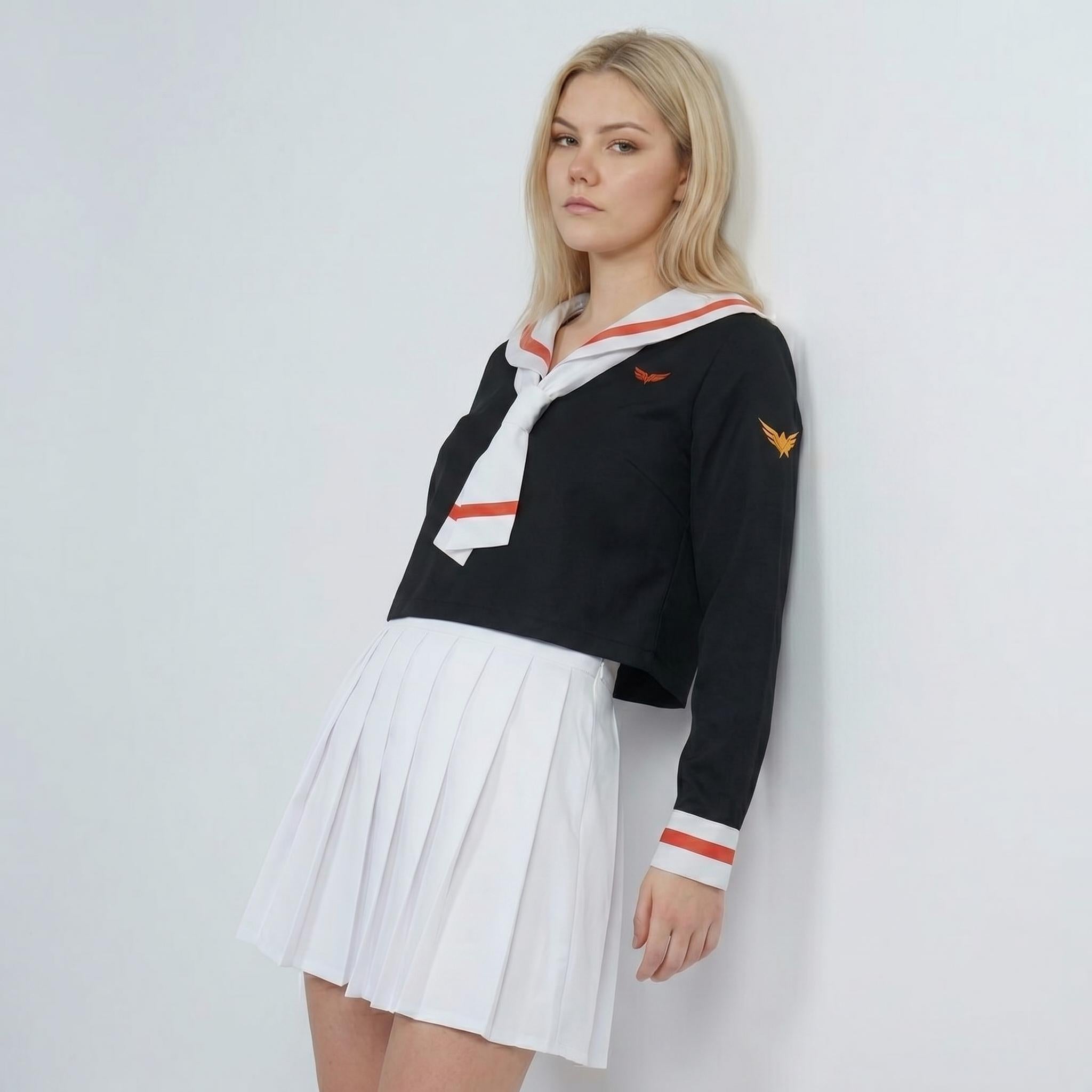 May include: A black long-sleeved sailor-style top featuring a white collar with orange stripes, a matching white necktie, and orange wing-like emblems on the chest and sleeve, paired with a crisp white pleated mini skirt.