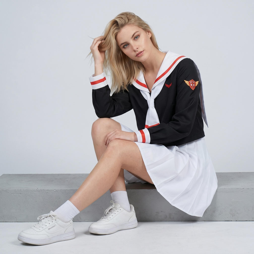 May include: A black long-sleeved top with a white sailor collar featuring red trim, a white tie, and a red and gold emblem on the left sleeve. The outfit includes a white pleated skirt, white ankle socks, and white sneakers with a lace-up design.