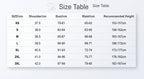 May include: A white size chart with measurements in centimeters. The chart includes sizes XS to 3XL, with corresponding shoulder, bust, waist, and recommended height measurements. The text "Size Table" is at the top.