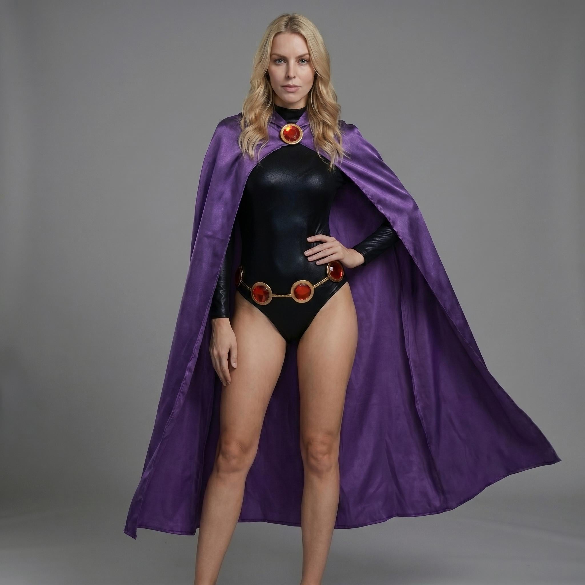 May include: A black bodysuit with long sleeves and a gold belt with red accents. A purple cape is draped over the shoulders. The costume has a high neckline and is worn by a person with blonde hair.