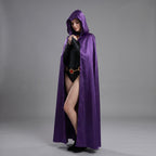 May include: A long, flowing purple hooded cape. The cape is made of a shiny, satin-like material. The person is wearing a black bodysuit with a gold belt with red accents. The hood is up, and the person is wearing black boots.