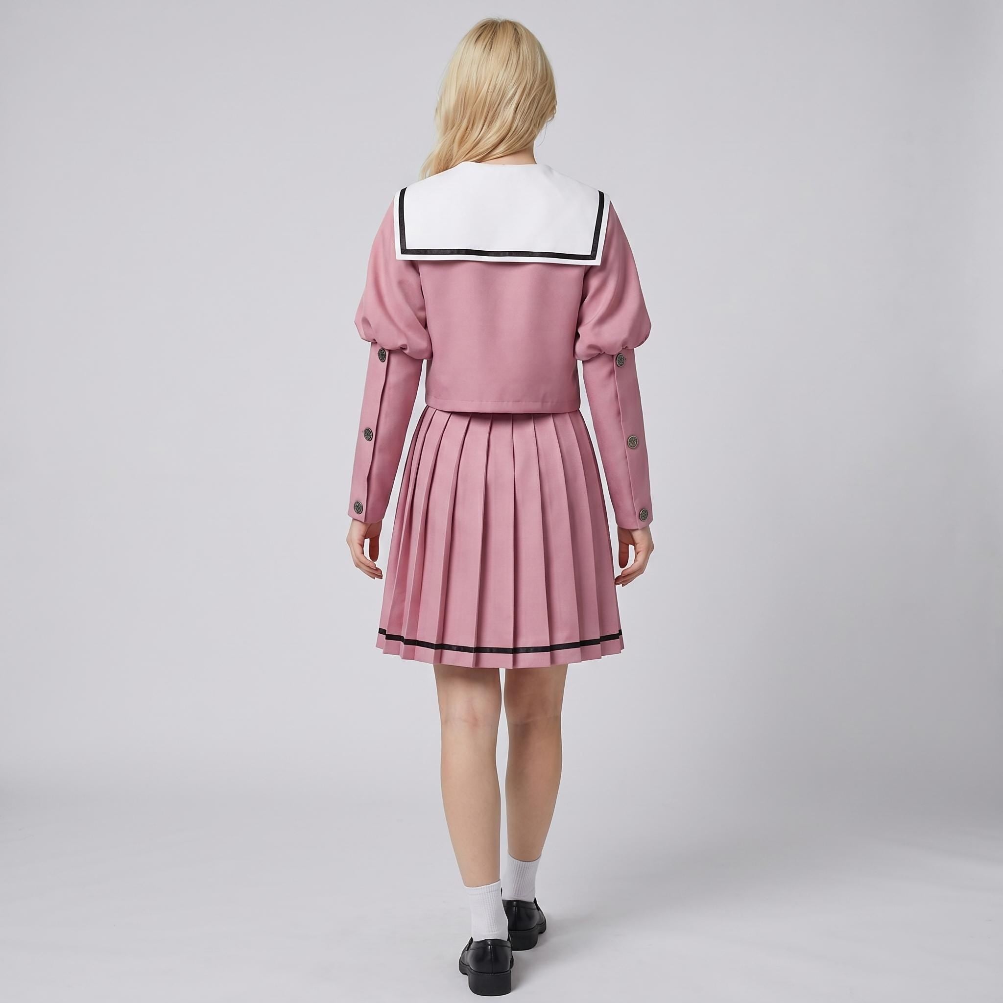 May include: A dusty rose sailor-style outfit consisting of a long-sleeved cropped jacket with a large white square collar featuring black trim, and a matching pleated skirt with a thin black horizontal stripe near the hem, worn with white socks.
