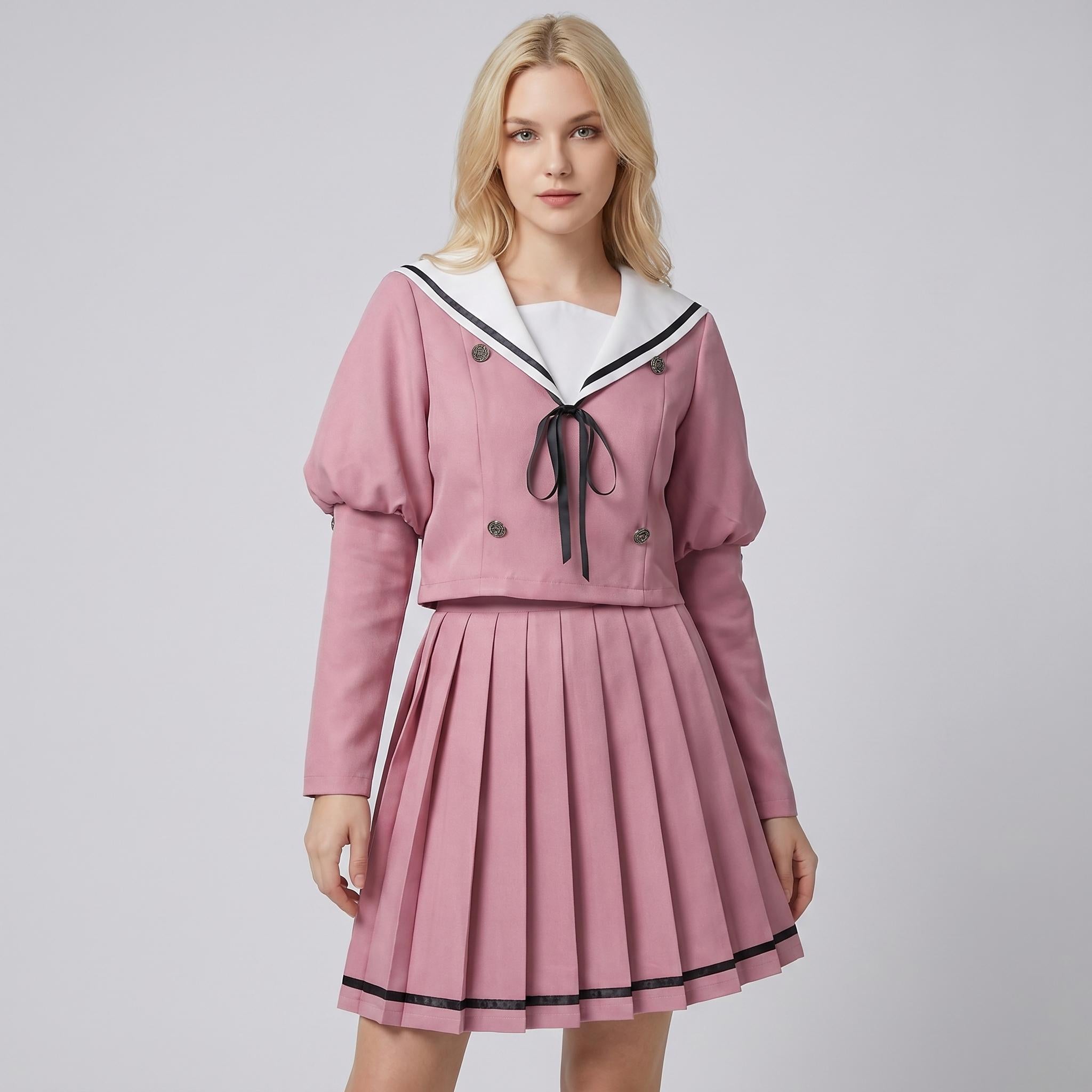 May include: A dusty rose two-piece set consisting of a long-sleeved cropped jacket and a pleated skirt. The jacket features a white sailor-style collar with black trim, a black ribbon tie, and four buttons. The skirt has a black hemline detail.